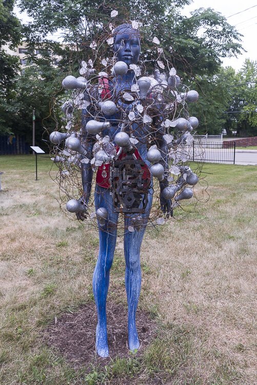 In Quincy Garden artist Abigail DeVille created an outdoor installation of semi-figurative and abstract sculptures that references the tradition of African American yard art.