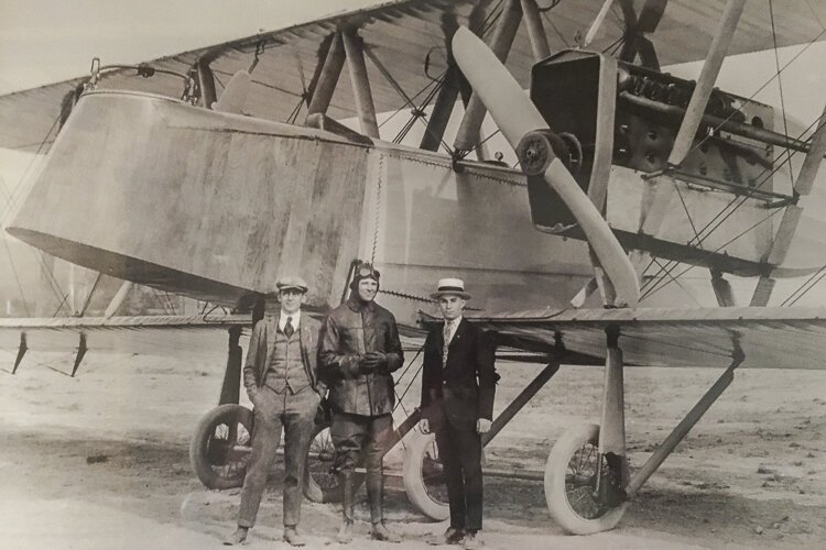 Martin Bomber built by the Glenn L. Martin Company which became the Great Lakes factory on St. Clair Ave. Left is Donald Douglas, future chairman of Douglas Aircraft, right is Larry Bell, later founder of Bell Aircraft - circa 1918/ 1919.