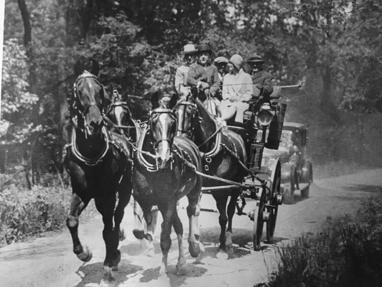 Demonstrating the excellent horsemanship he was well known for, longtime Waite Hill resident Charles Otis drives a four in hand to bring a party of friends to the dedication of St. Hubert’s - June 3, 1929