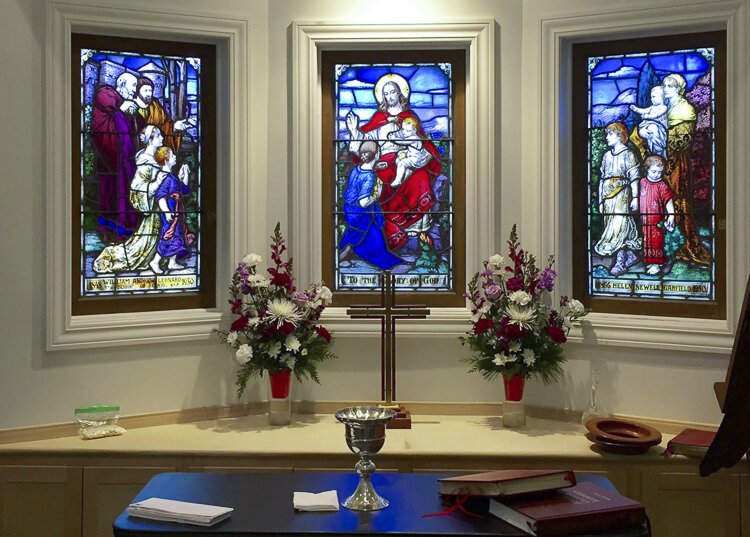 Evans room at St. Hubert's featuring the Garfield stained glass windows