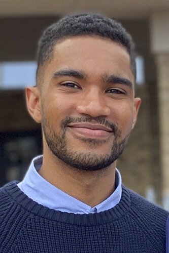 <span class="content-image-text">Zachary Thomas, executive director of Writers in Residence</span>