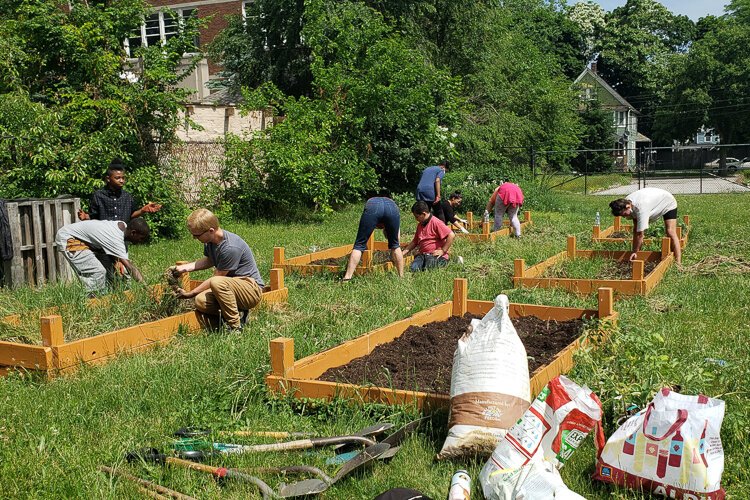 FoodStrong preparing the garden beds at Willson School to plant.