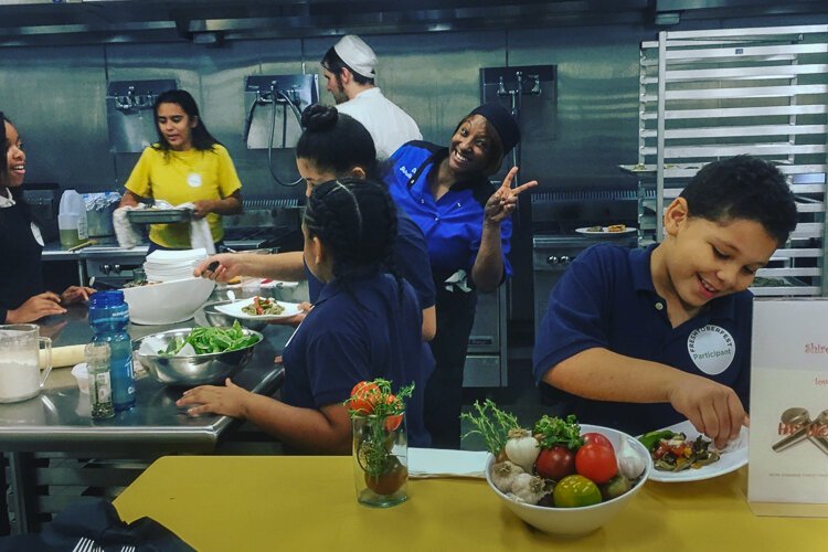 <span class="content-image-text">Chef Shirelle Boyd. cooking demonstrations arranged by Famicos</span>