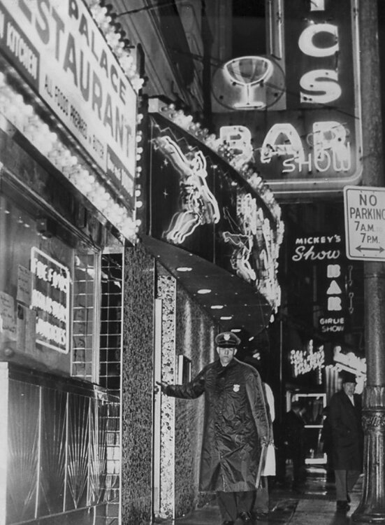 A policeman patrols the bars and nightclubs along Short Vincent in 1964.