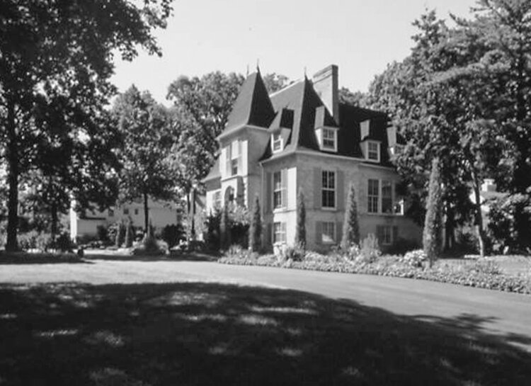 <span class="content-image-text">13825 Edgewater Drive in Lakewood, built about 1925 and designed in the French Eclectic style for the family of Capt. Charles Hutchinson.</span>