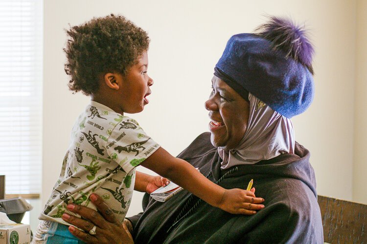 Robin Turner, with her grandson Treshawn Johnson Jr. in her Stockyards home, has sought for months to reverify her enrollment in the PIPP assistance program, but she’s run into obstacles.