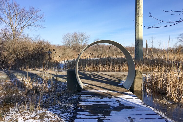 A cross section of Southwest Interceptor pipe acts as a welcome gateway to Towpath hikers and bikers.