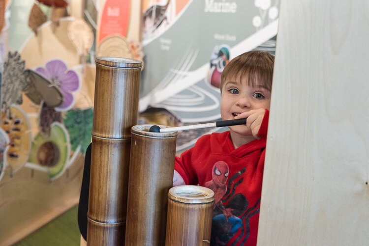 Toddlers can make music with bamboo in the Playspace
