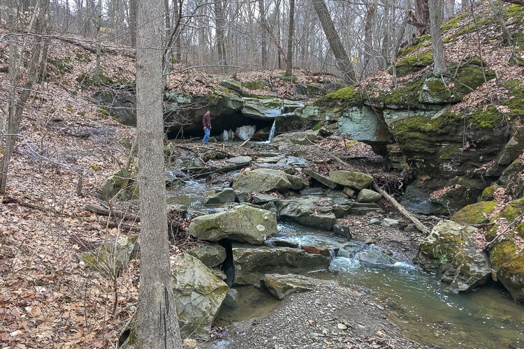 Exploring rock formations near Deer Lick Cave.