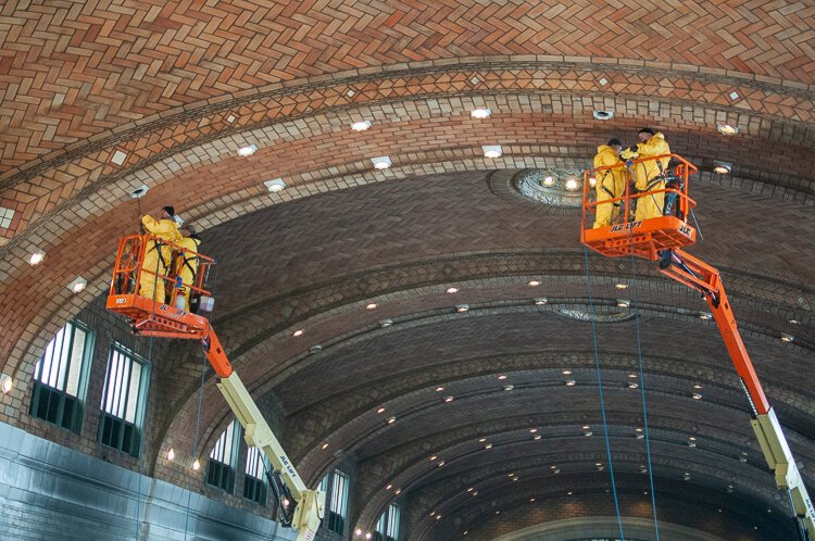 Cleaning the Guastavino ceiling in the West Side Market after the fire in 2013