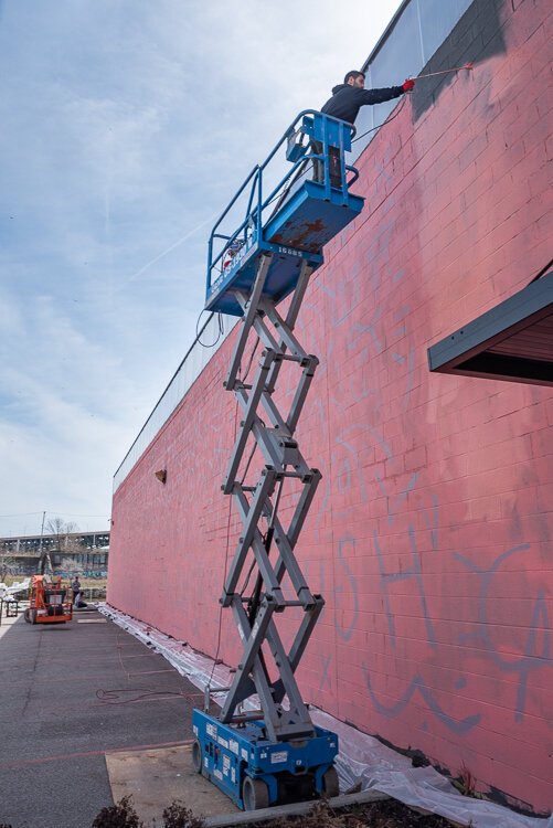 <span class="content-image-text">Early on in the mural process with just the base coat and guide markings</span>