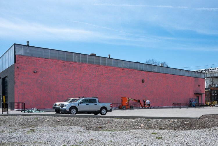 Early on in the mural process with just the base coat and guide markings