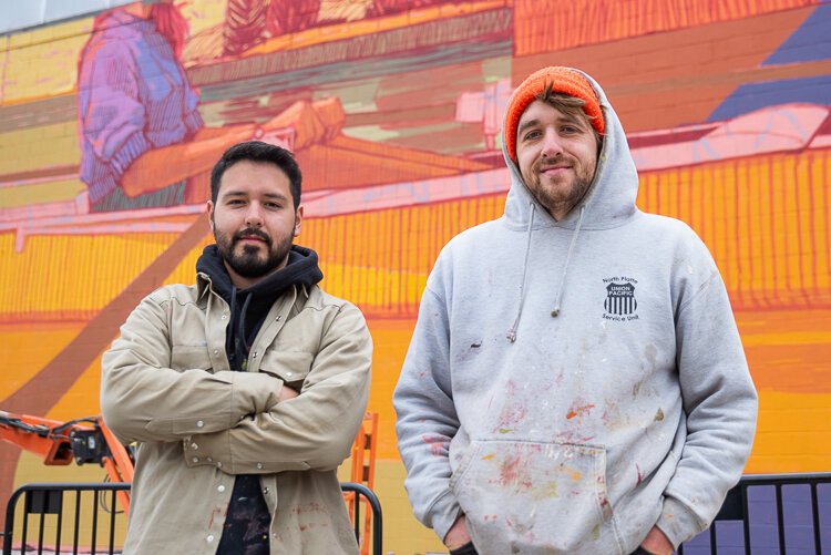 <span class="content-image-text">Detroit artist Pat Perry (right) and Detroit artist Ivan Montoya who helped paint the mural</span>