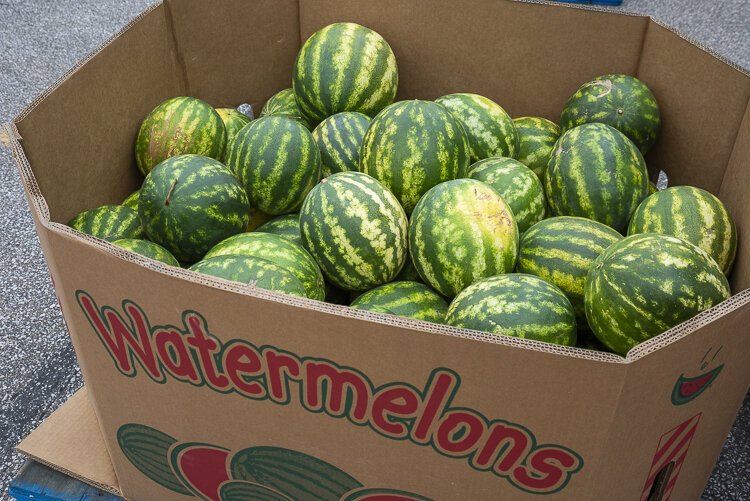 The Cleveland Food Bank distributes potatoes, watermelons, English muffins, and more at the Muni lot each Thursday