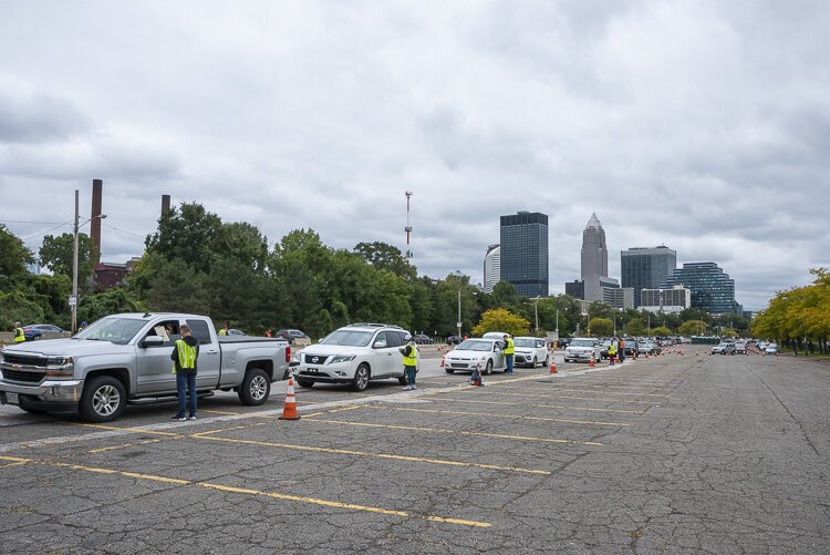 <span class="content-image-text">A long line of cars for the Cleveland Food Bank Mobile Pantry Program at the City of Cleveland Muni Lot</span>