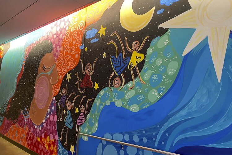 <span class="content-image-text">Playhouse Square’s 100th anniversary mural “Together We Shine”</span>