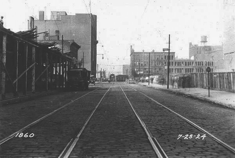 Looking west on Champlain St. from Ontario St. during excavation work for the Union Terminal - 1924