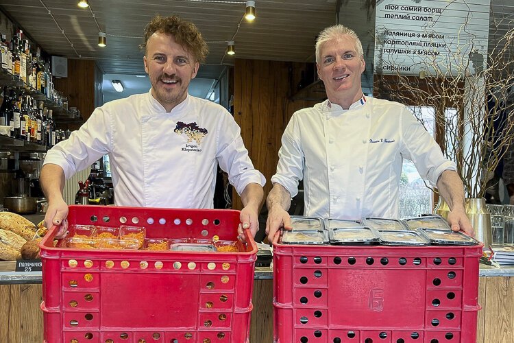 Chef Brandon Chrostowski’s first day working with Chef Klopotenko (left) in Ukraine