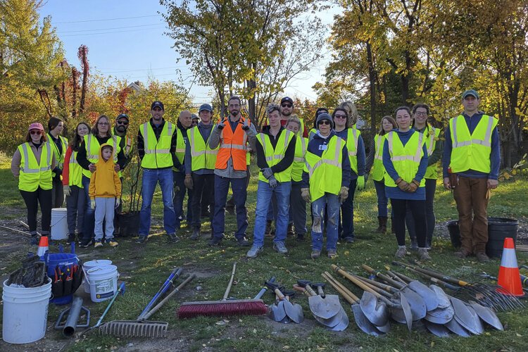 <span class="content-image-text">Land Conservancy staff and volunteers host a tree planting in Cleveland</span>