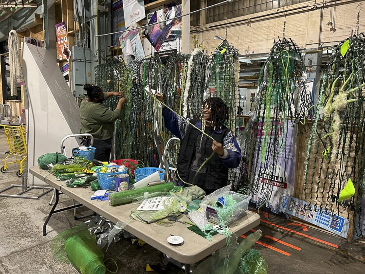 Raven Clark and Felicia Jackson are decorating pros with the help of project lead Creator Carla (not pictured) they were able to upcycle green colored scraps into our Seaweed Spectacular!