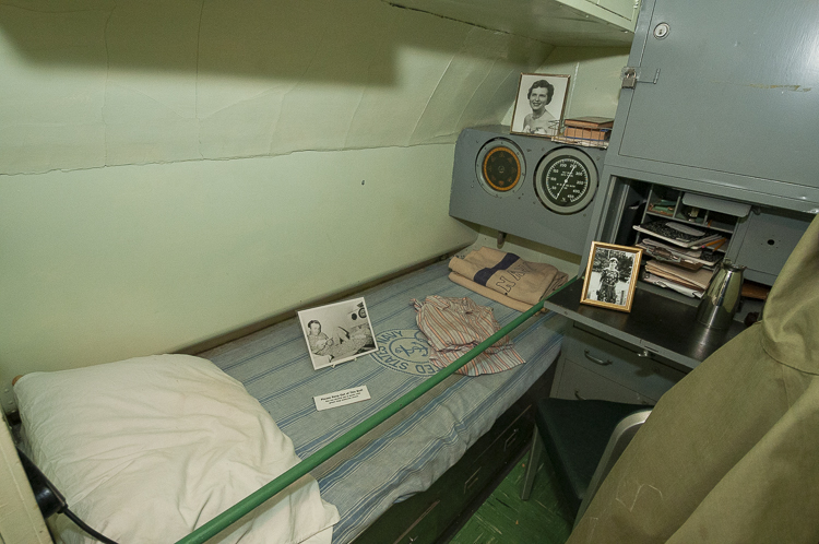 The captain has a private room, which is easily identified by the gyrocompass repeater and depth gauge at the foot of his bunk