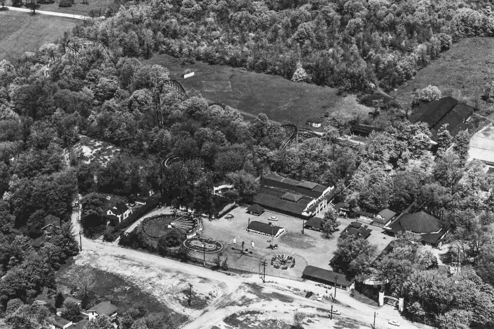 Aerial view of Puritas Springs shows the layout of the 75-acre park. Note the rollercoaster that enters the wooded areas