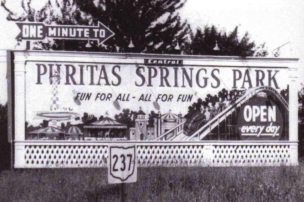 The roadside billboard one mile from the entrance to Puritas Springs Park. The sign highlighted the midway and rollercoaster.