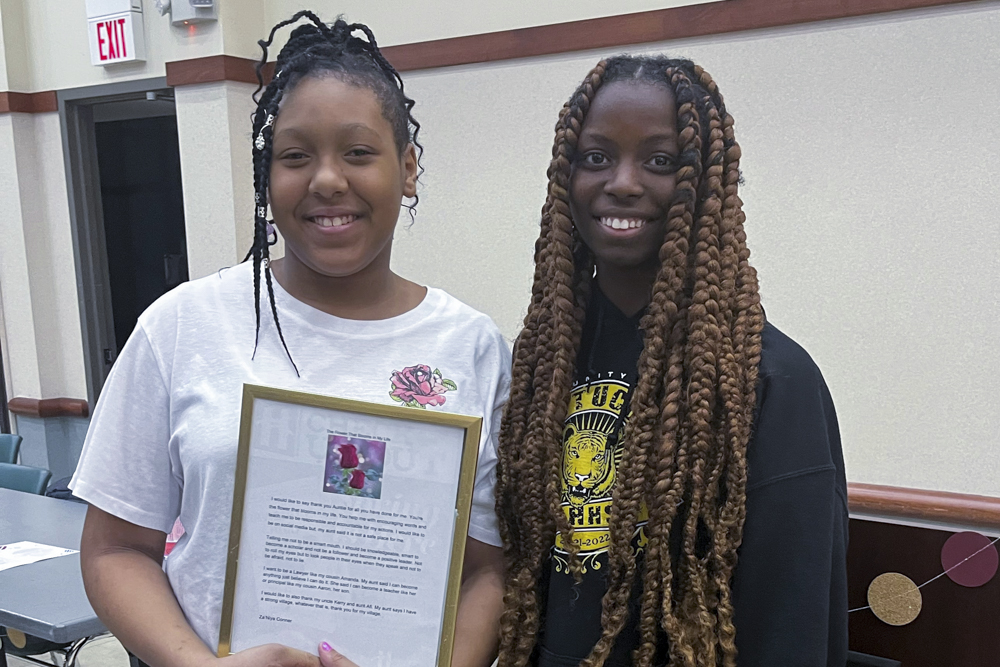 Zaniyah Conner, member of the Monticello Ink Spot program and Myieshia Hodges, a member of the Poetry Club Lake Erie Ink facilitates at Heights High School