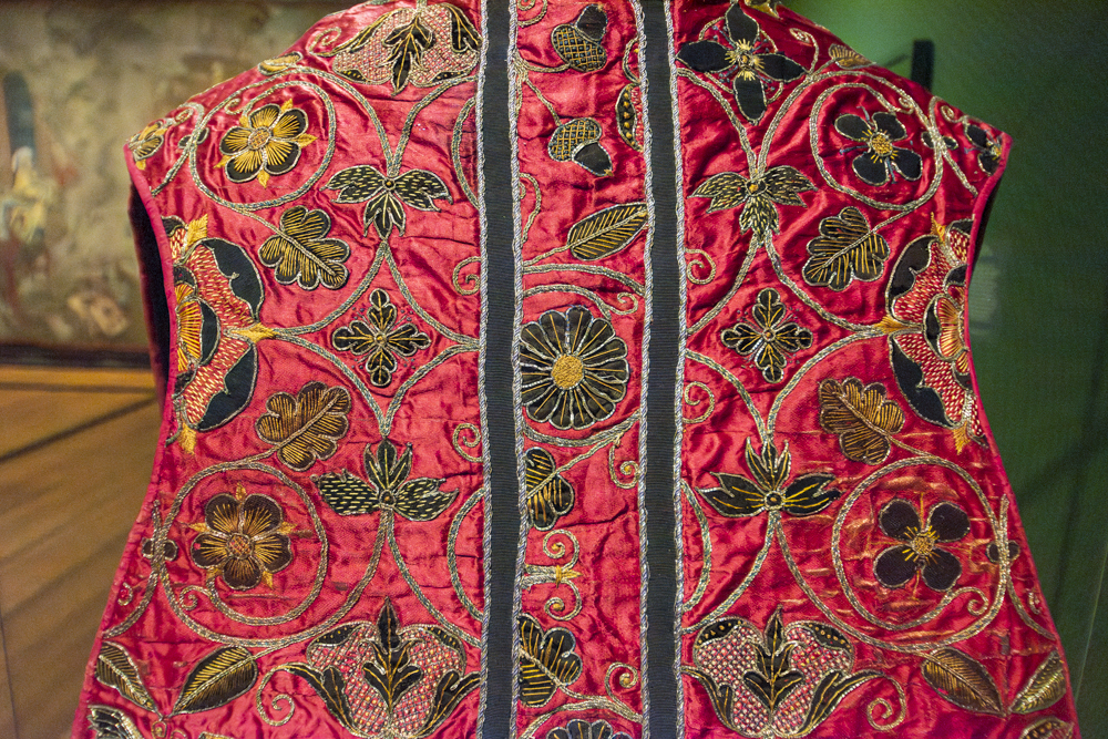 Chasuble 1550-1600 - satin embroidered with gilded silver metal wrapped threads, note the Tudor rose that symbolized the union of Lancaster and York royal families