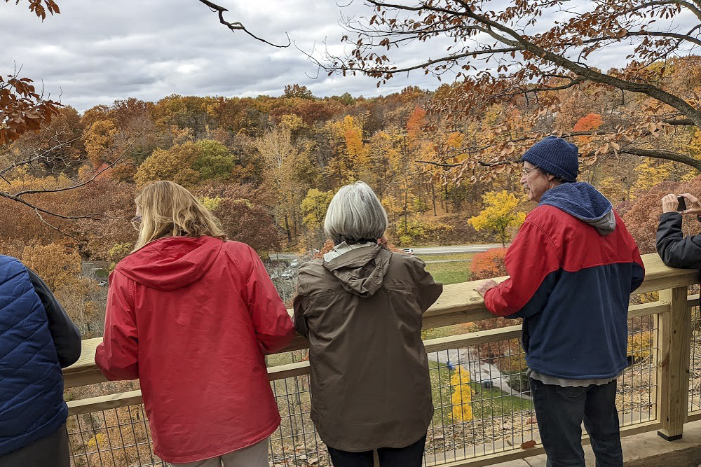 Hikers view the foliage last October from atop the Eastern Ledge Trail