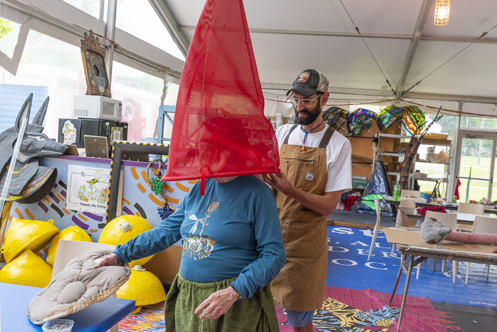 Costume fitting inside the Parade the Circle artist tent