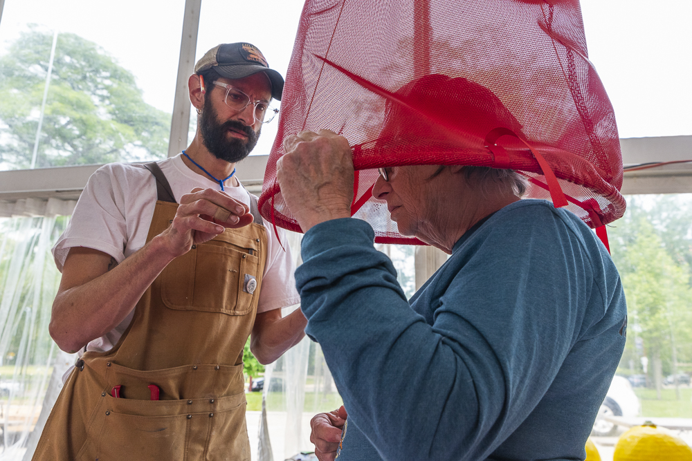 Costume fitting inside the Parade the Circle artist tent