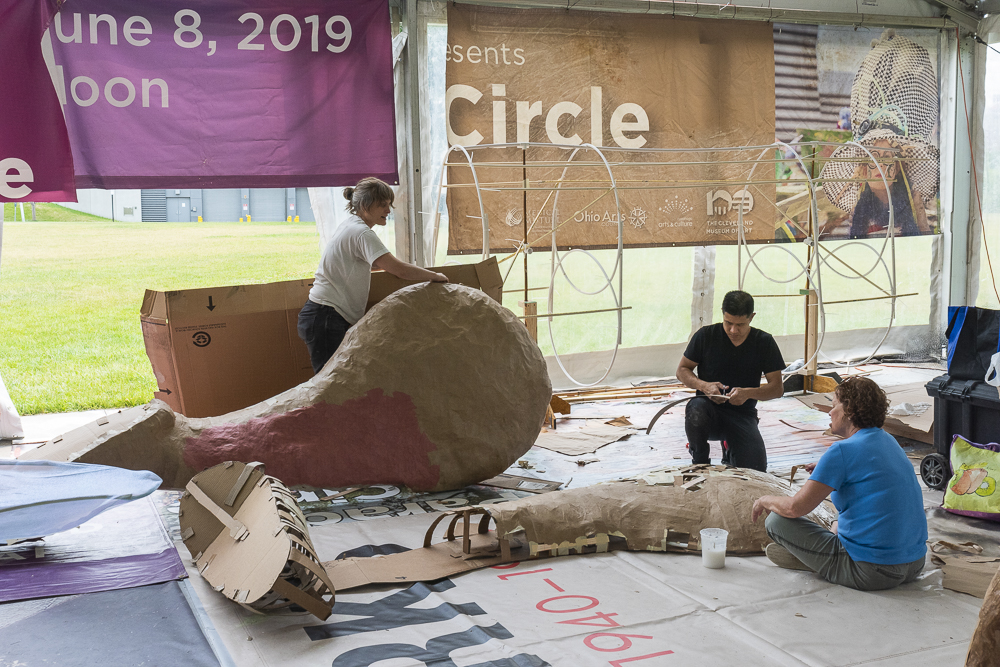 Guest artist Liza Goodell from Philadelphia and her crew work on her cat themed parade float