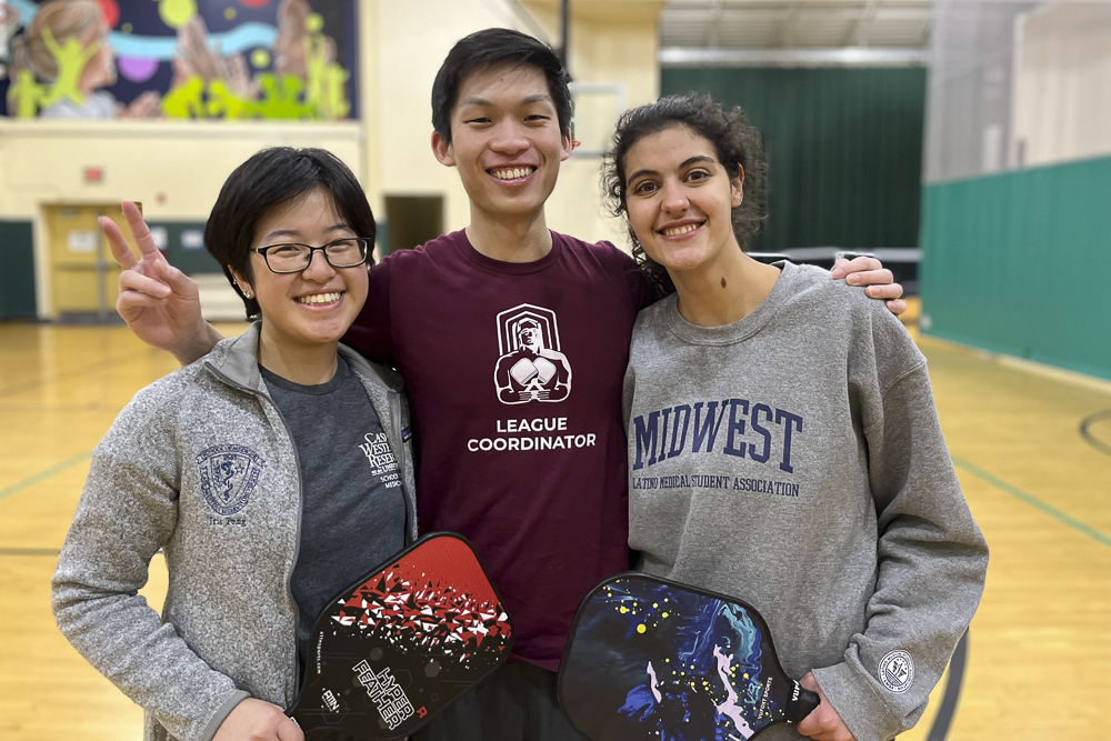Andy Chen, center, with Iris Peng and Jackie Diaz