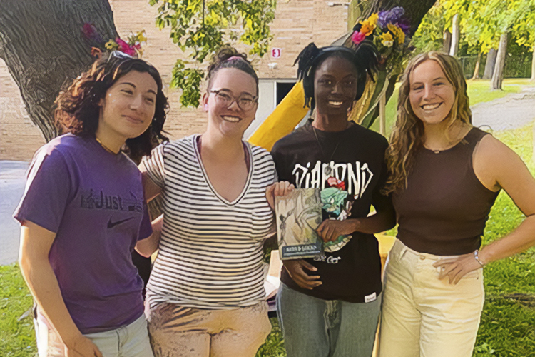 Julia Pentasuglio, Myieshia and Emily with Teen Book advisor, AJ