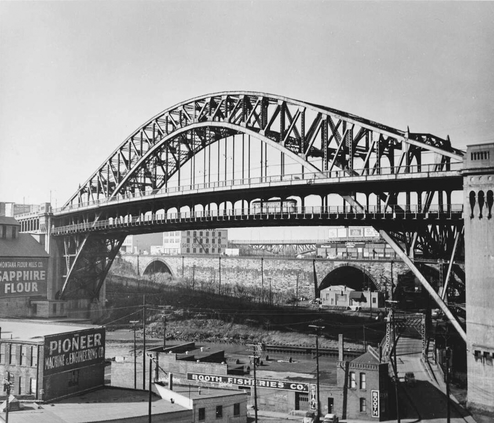The Detroit-Superior Bridge is shown in front of the Superior Viaduct, which closed to traffic not long after the Detroit bridge opened