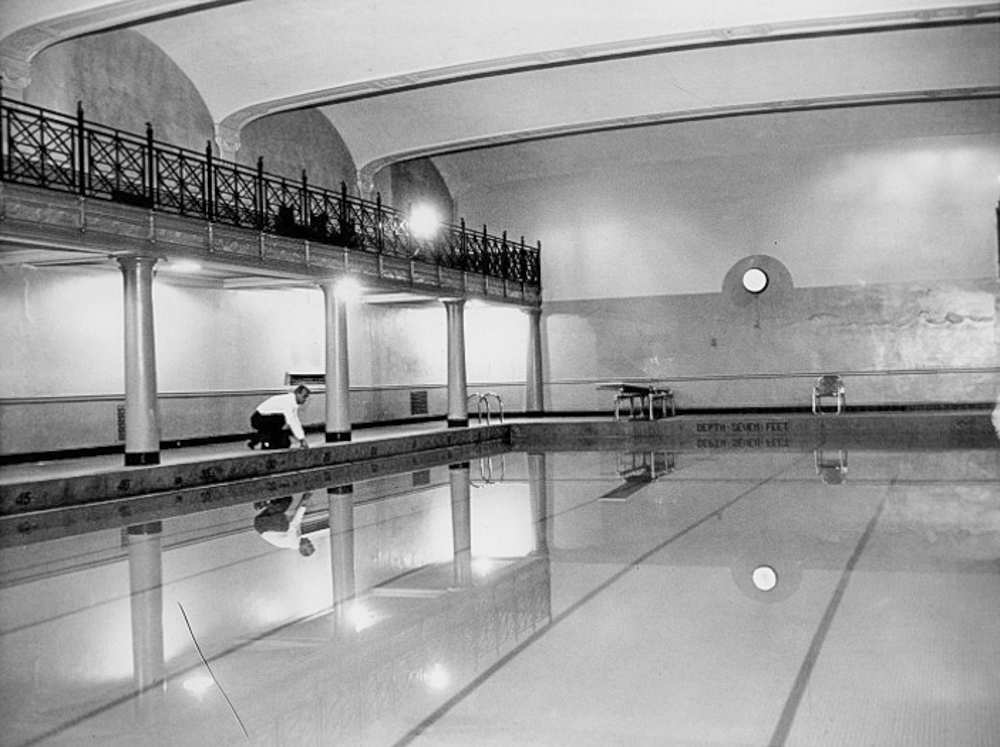 The Tudor Arms was once a private, exclusive athletic club and had sporting facilities on its first few floors, including an indoor swimming pool – ca. 1960