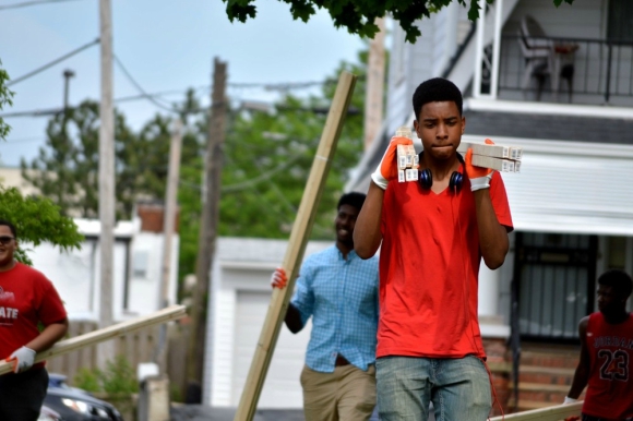 MOOS students carry lumber in Shaker Heights’ Hildana Park