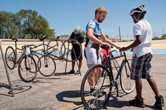 Gary Burkholder with a neighborhood boy at the Cleveland Velodrome