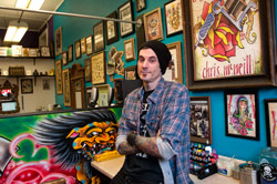 Chris McNeill owner of Rebel City Tattoo - Photo Bob Perkoski