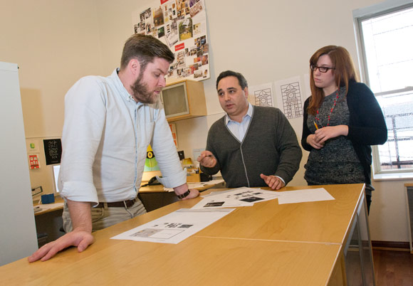 Art Director Joel Miller, President & Chief Creative Officer Mike Ozan and designer Stacey Martin of Twist Creative