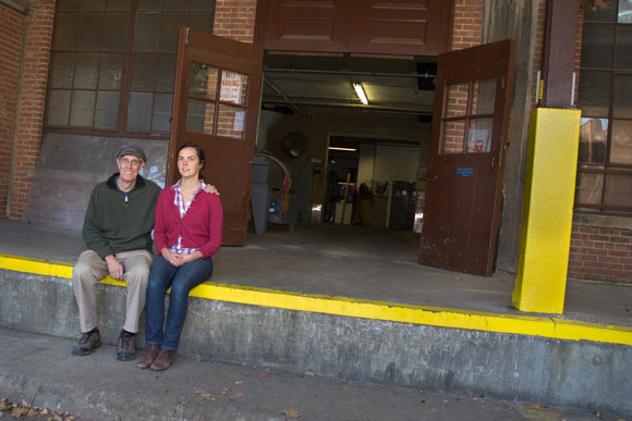 Molly Murray, with her father Patrick Murray, on the loading dock of the 100-year-old Hildebrandt Building, future home for Wake Robin Fermented Foods
