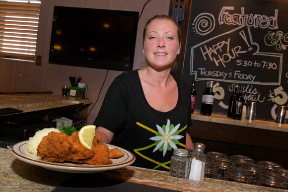 Kimberly Bork of Sterles Country House serves up a plate of Weinerschnitzel