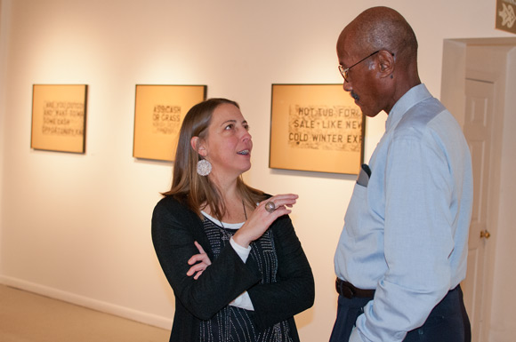 Artist Liz Maugans chats with photographer Dale Goode at their exhibition at Arts Colinwood