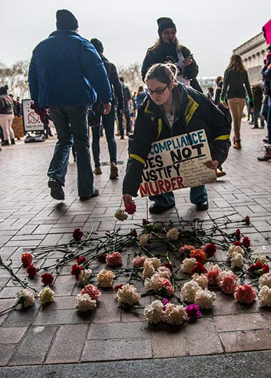 Cleveland Protests - laying flowers at the Justice Center