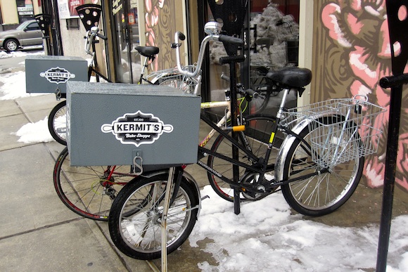 Pizza-themed bike racks outside Kermit’s Pizzeria on Washington Ave. West