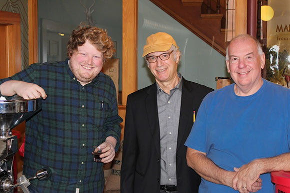 Zev Siegl (center) with John Johnson and Kim Jenkins of Rising Star