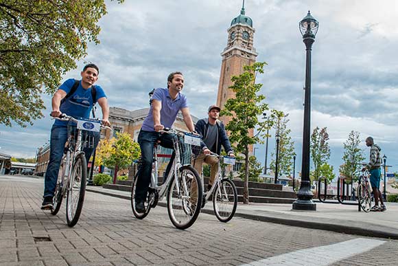 Justin Carson, Sam McNulty and Justin Beretelone riding on Zagster in Ohio City