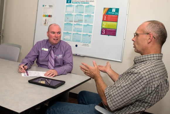 Dennis Joyce (left) career development specialist - Plus 50 Encore Completion program