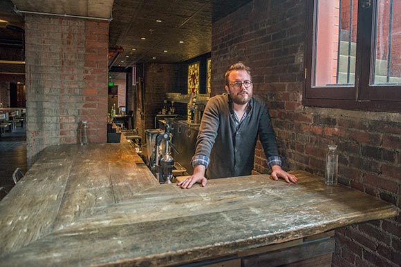 Bar top at The Spotted Owl by (ARC)form, Will Hollingsworth owner pictured